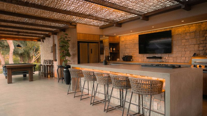 outdoor kitchen with TV