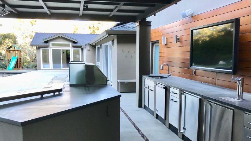 outdoor kitchen with TV