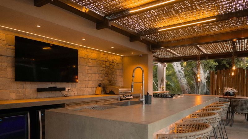 outdoor kitchen with TV